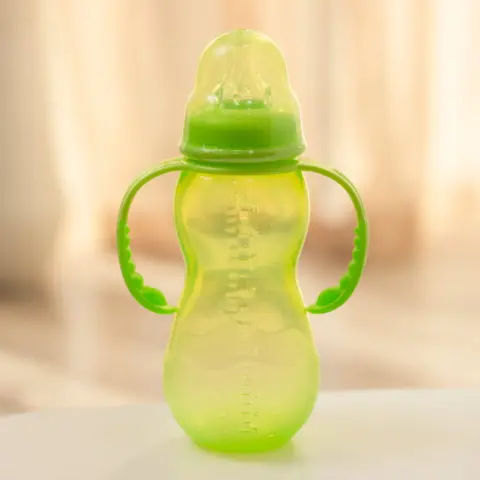 Фото Nuby Детская Бутылочка Тренировочная с соской и ручками Evolution Bottle 2в1