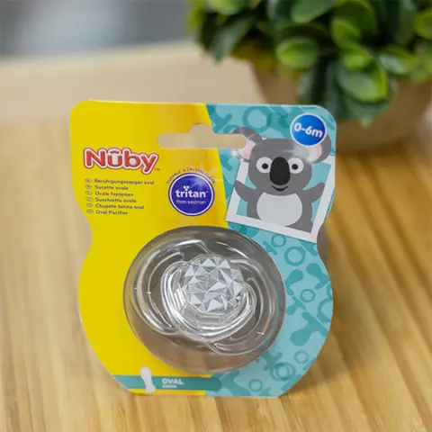 Фото Пустышка Nuby Три уголник 0-6 мес.