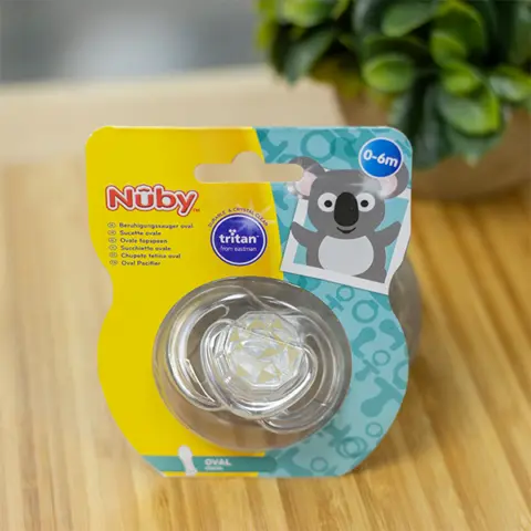 Фото Пустышка Nuby Три уголник 0-6 мес.