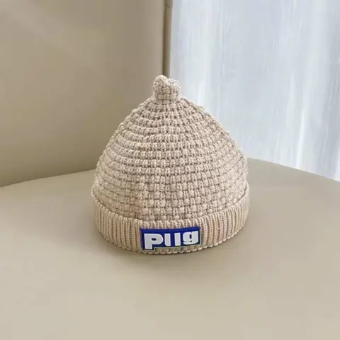 Фото Шапка вязанная Piig Молочный